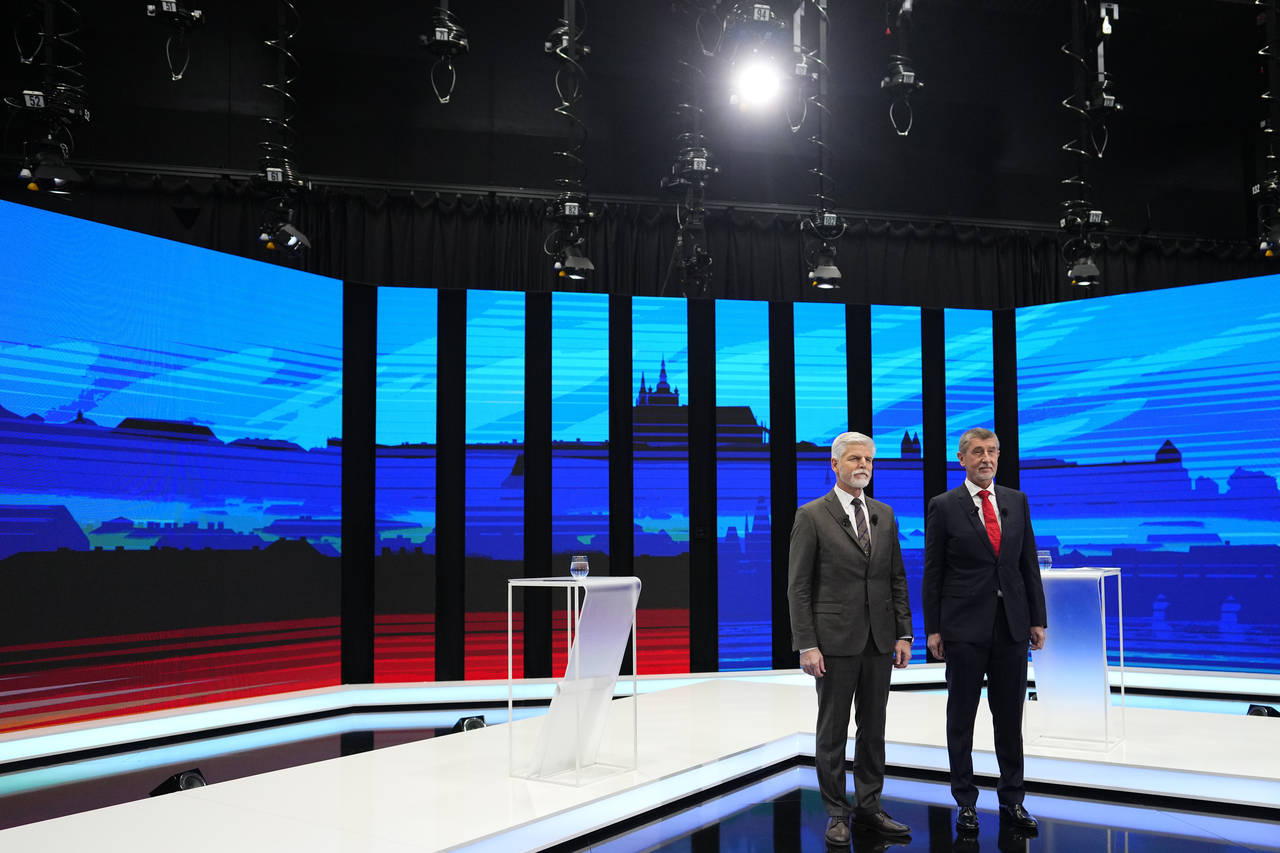 FILE - Presidential candidates, retired army Gen. Petr Pavel, left, and former Czech Republic's pri...