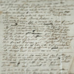 
              The handwritten letter from 1723 – whose author says they are remaining anonymous for fear they will "swing upon the gallows tree" if exposed, is displayed at the exhibition in the Lambeth Palace Library, in London, Tuesday, Jan. 31, 2023. A letter written by an enslaved person in Virginia 300 years ago seeking freedom is part of a new exhibition exploring the Church of England's historic links to slavery. It's part of efforts by the Anglican church to reckon with its historic complicity in slavery. (AP Photo/Kin Cheung)
            