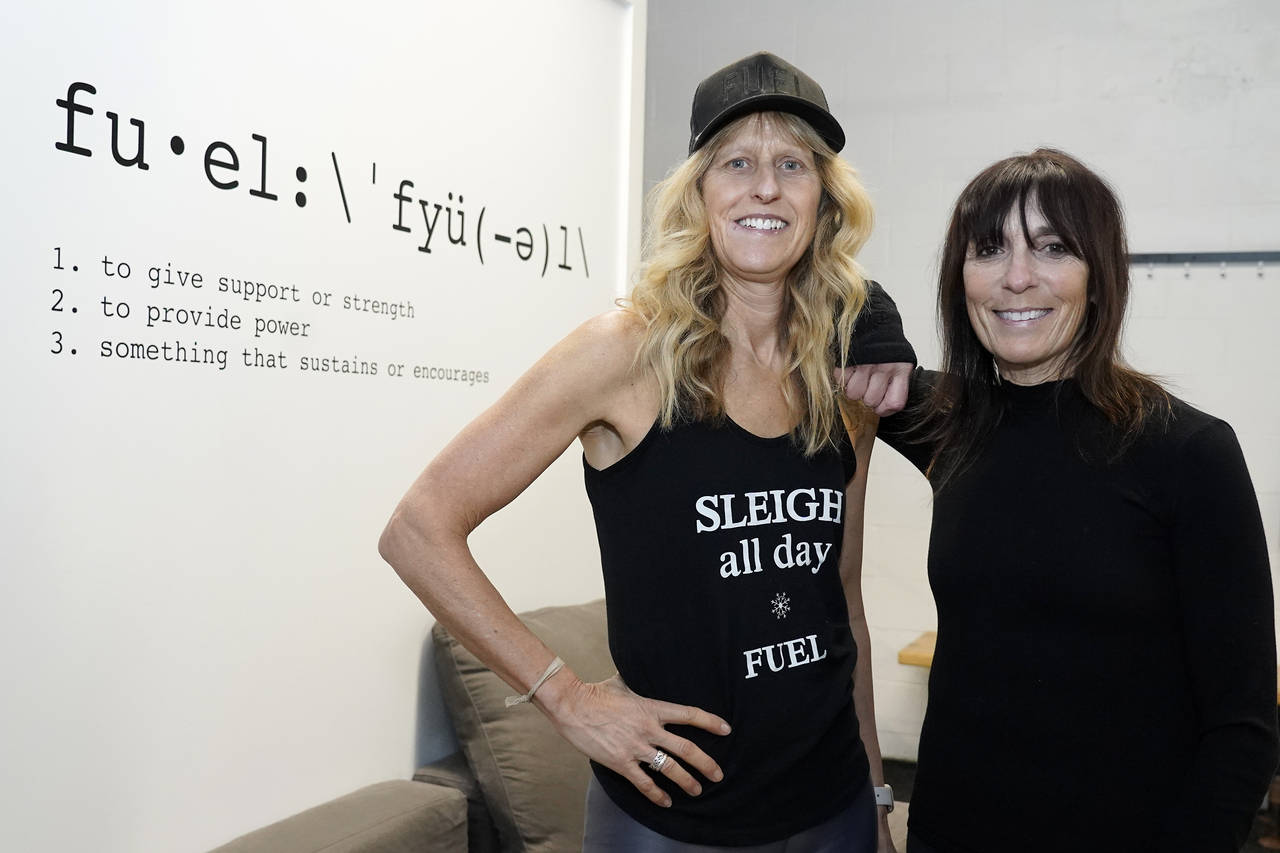Fuel Training Studio owners Julie Bokat, left, and Jeanne Carter pose for a photo inside their gym,...