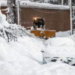
              A snow plow works to clear snow on a road, the morning after a winter storm pelted the region with a large amount of snow, in South Lake Tahoe, Calif., Sunday, Jan. 1, 2023. (Stephen Lam/San Francisco Chronicle via AP)
            