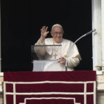 
              Pope Francis delivers his blessing as he recites the Angelus noon prayer from the window of his studio overlooking St. Peter's Square, at the Vatican, Sunday, Jan. 1, 2023. Pope Emeritus Benedict XVI, the German theologian who will be remembered as the first pope in 600 years to resign, has died, the Vatican announced Saturday. He was 95. (AP Photo/Andrew Medichini)
            