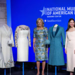 
              First lady Jill Biden, center, is joined by designers Gabriela Hearst, left, and Alexandra O'Neill, at an event to present her 2021 inaugural ensembles to the Smithsonian's National Museum of American History, Wednesday, Jan. 25, 2023, in Washington. (AP Photo/Alex Brandon)
            