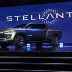 
              The Ram 1500 Revolution electric battery powered pickup truck is displayed on stage during the Stellantis keynote at the CES tech show Thursday, Jan. 5, 2023, in Las Vegas. (AP Photo/John Locher)
            