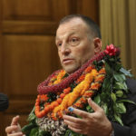 
              Hawaii Gov. Josh Green speaks to reporters after delivering his State of the State address to a joint session of the state Legislature in Honolulu, on Monday, Jan. 23, 2023. Green on Monday proposed investing $1 billion in affordable housing and giving tax breaks to people of all income levels to lower the cost of living in the islands. (AP Photo/Audrey McAvoy)
            
