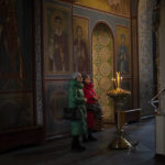 
              CORRECTS DAY OF THE WEEK   Women pray at the St. Michael's Golden-Domed Monastery in Kyiv, Ukraine, Tuesday Jan. 31, 2023. (AP Photo/Daniel Cole)
            