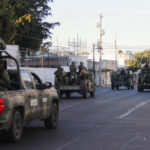 
              An army convoy patrols the streets of Culiacan, Sinaloa state, Thursday, Jan. 5, 2023. Mexican security forces captured Ovidio Guzmán, an alleged drug trafficker wanted by the United States and one of the sons of former Sinaloa cartel boss Joaquín “El Chapo” Guzmán, in a pre-dawn operation Thursday that set off gunfights and roadblocks across the western state’s capital. (AP Photo/Martin Urista)
            
