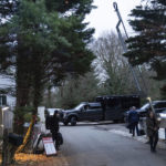 
              FILE - The access road to President Joe Biden's home in Wilmington, Del., is seen from the media van on Jan. 13, 2023. Biden’s decision to allow the FBI to search his home in Delaware last week is laying him open to fresh negative attention and embarrassment following the discovery of classified documents at his home and former office. But it's part of a legal and political calculation that aides believe will pay off in the long run as he prepares to seek reelection. (AP Photo/Carolyn Kaster, File)
            