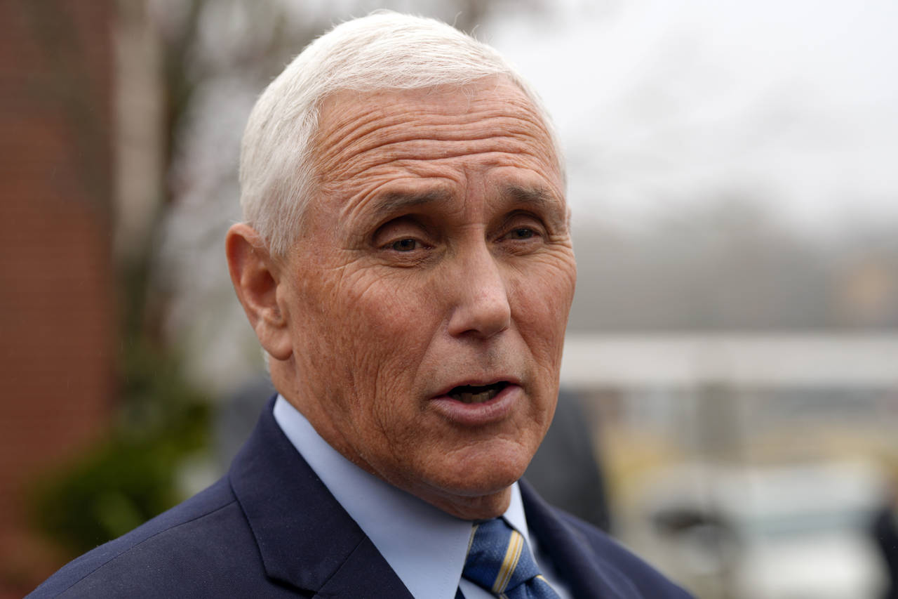 FILE - Former Vice President Mike Pence speaks with reporters Dec. 6, 2022, at Garden Sanctuary Chu...