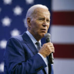 
              FILE - President Joe Biden speaks during a visit to the Detroit Auto Show, Sept. 14, 2022, in Detroit. Biden persuaded Democrats in Congress to provide hundreds of billions of dollars to fight climate change. Now comes another formidable task: enticing Americans to buy millions of electric cars, heat pumps, solar panels and more efficient appliances.  (AP Photo/Evan Vucci, file)
            