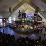 
              People arrive to attend a service honoring Martin Luther King Jr. at Ebenezer Baptist Church in Atlanta, Sunday, Jan. 15, 2023. (AP Photo/Carolyn Kaster)
            