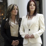 FILE - Lisa Marie Presley, left, and her mother Priscilla Presley await the arrival of Japanese Prime Minister Junichiro Koizumi and President Bush before they toured Graceland, the home of Elvis Presley, Friday June 30, 2006 in Memphis, Tenn. Koizumi is a lifelong fan of the late rock and roll legend. Lisa Marie Presley, singer and only child of Elvis, died Thursday, Jan. 12, 2023, after a hospitalization, according to her mother, Priscilla Presley. She was 54. (AP Photo/Rob Carr, File)