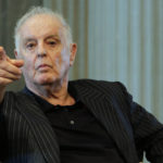 
              FILE -- Daniel Barenboim, general music director of the Berlin State Opera and the Staatskapelle Berlin, gestures during a press conference in Berlin, Germany, Tuesday, June 4, 2019. Daniel Barenboim on Friday announced his resignation as the general music director of Berlin's Staatsoper, a job that he has held for over three decades, saying that his health has become too poor to carry on. (AP Photo/Markus Schreiber, file)
            