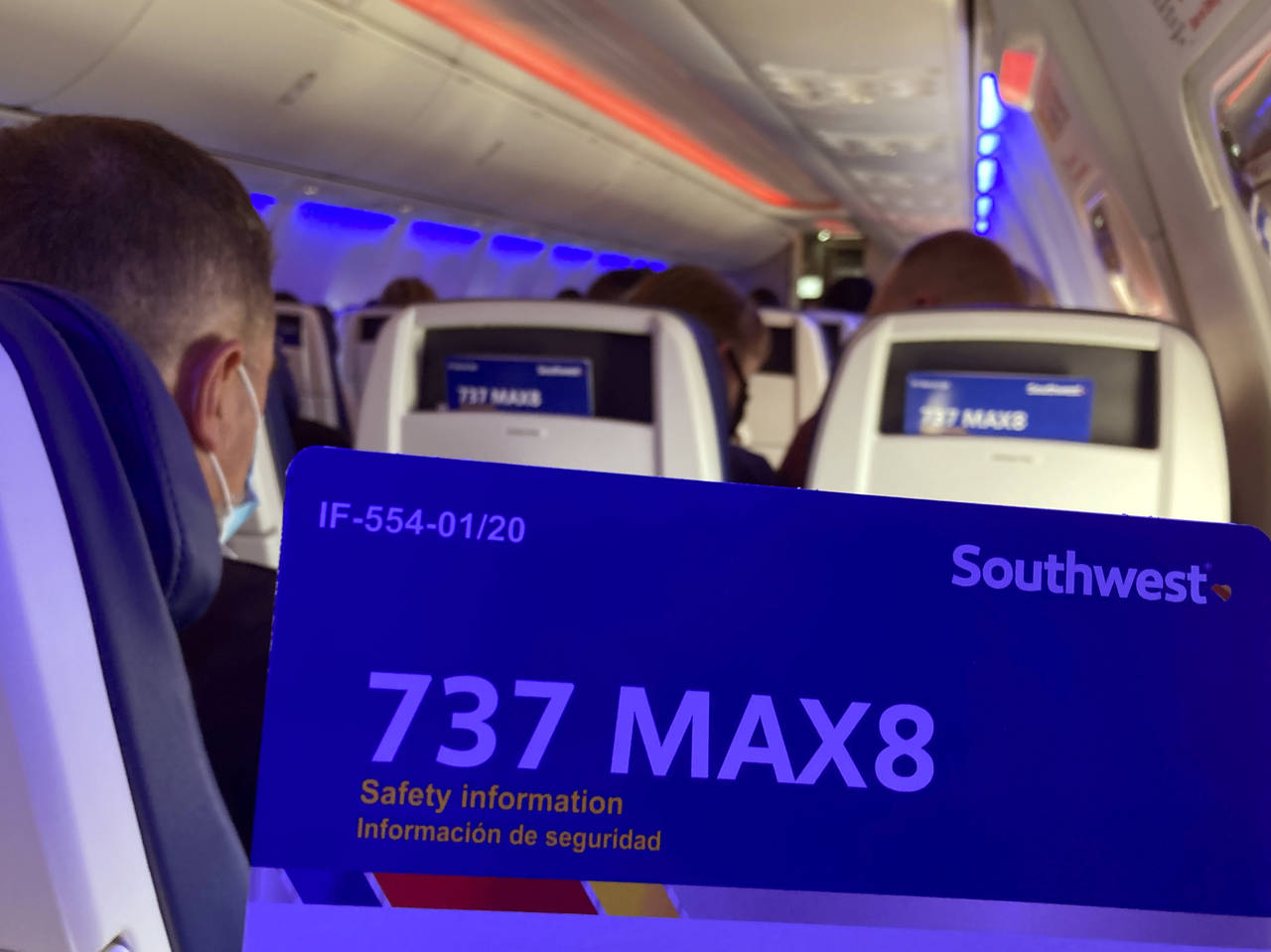 FILE - Passengers on a Southwest Airlines Boeing 737 MAX 8 flight prepare to land at Houston's Hobb...