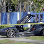 
              FILE - An empty vehicle appears on a street where rapper XXXTentacion was shot on Monday, June 18, 2018, in Deerfield Beach, Fla.  More than four years after gunmen killed the emerging rap star XXXTentacion during a robbery outside a South Florida motorcycle shop, three suspects are about to go on trial. Jury selection begins Wednesday, Jan. 18, 2023, in Fort Lauderdale. Alleged shooter Michael Boatwright and his accused accomplices, Dedrick Williams and Trayvon Newsome, could all receive life sentences if convicted of first-degree murder. (John McCall/South Florida Sun-Sentinel via AP, File)
            