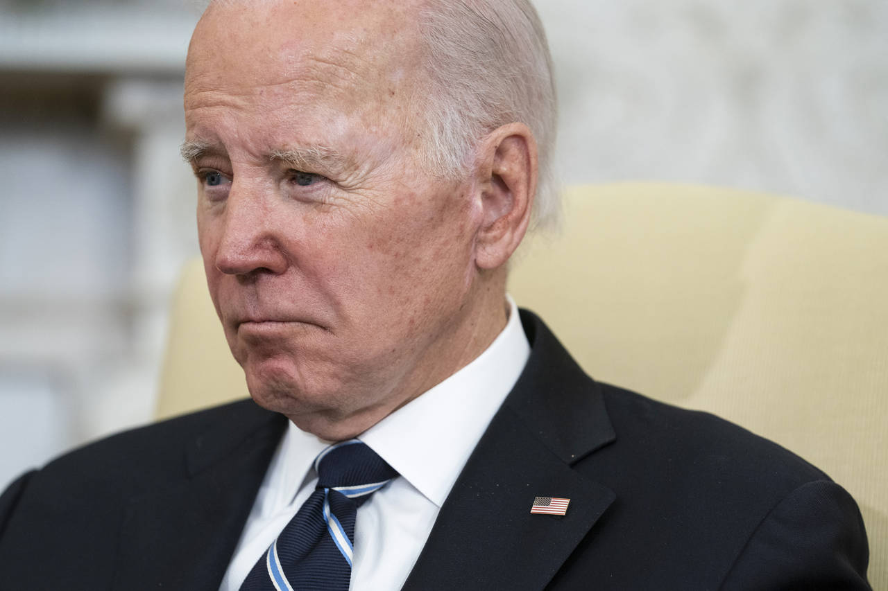 President Joe Biden listens as Japanese Prime Minister Fumio Kishida speaks during a meeting in the...