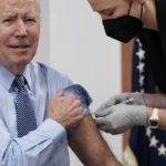 
              FILE - President Joe Biden receives his second COVID-19 booster shot in the South Court Auditorium on the White House campus, March 30, 2022, in Washington. (AP Photo/Patrick Semansky, File)
            