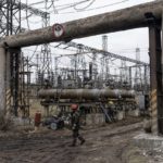 
              Workers at a power plant, try to repair damages after a Russian attack in central Ukraine, Thursday, Jan. 5, 2023. When Ukraine was at peace, its energy workers were largely unheralded. War made them heroes. They're proving to be Ukraine's line of defense against repeated Russian missile and drone strikes targeting the energy grid and inflicting the misery of blackouts in winter. (AP Photo/Evgeniy Maloletka)
            