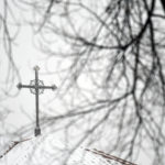 
              A cross sits atop a building at the Archdiocese of Denver campus on Wednesday, Jan. 18, 2023. The archdiocese is being sued by a man who alleges about 100 instances of abuse at St. Elizabeth Ann Seton Church in Fort Collins, Colo., from 1998 to 2003. The lawsuit is allowed under a 2021 state law that opened up a three-year window for people to pursue litigation for sexual abuse that happened to them as children dating as far back as 1960.(AP Photo/Thomas Peipert)
            