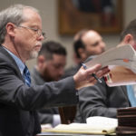 
              Prosecutor Creighton Waters reviews court procedure during Alex Murdaugh's trial for murder at the Colleton County Courthouse on Tuesday, Jan. 31, 2023 in Walterboro, S.C.  Murdaugh, 54, is standing trial on two counts of murder in the shootings of his 52-year-old wife and 22-year-old son. Murdaugh faces 30 years to life in prison if convicted. (Joshua Boucher/The State via AP, Pool)
            