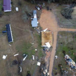 
              Devastation is seen in the aftermath from severe weather, Thursday, Jan. 12, 2023, in Greensboro, Ala. A giant, swirling storm system billowing across the South spurred a tornado on Thursday that shredded the walls of homes, toppled roofs and uprooted trees. (Mike Goodall via AP)
            
