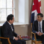 
              Britain's Prime Minister Rishi Sunak, right, speaks with Japan's Prime Minister Fumio Kishida during a bilateral meeting at the Tower of London, Wednesday, Jan. 11, 2023. The leaders of Britain and Japan are signing a defense agreement on Wednesday that could see troops deployed to each others’ countries. (Carl Court/Pool Photo via AP, File)
            