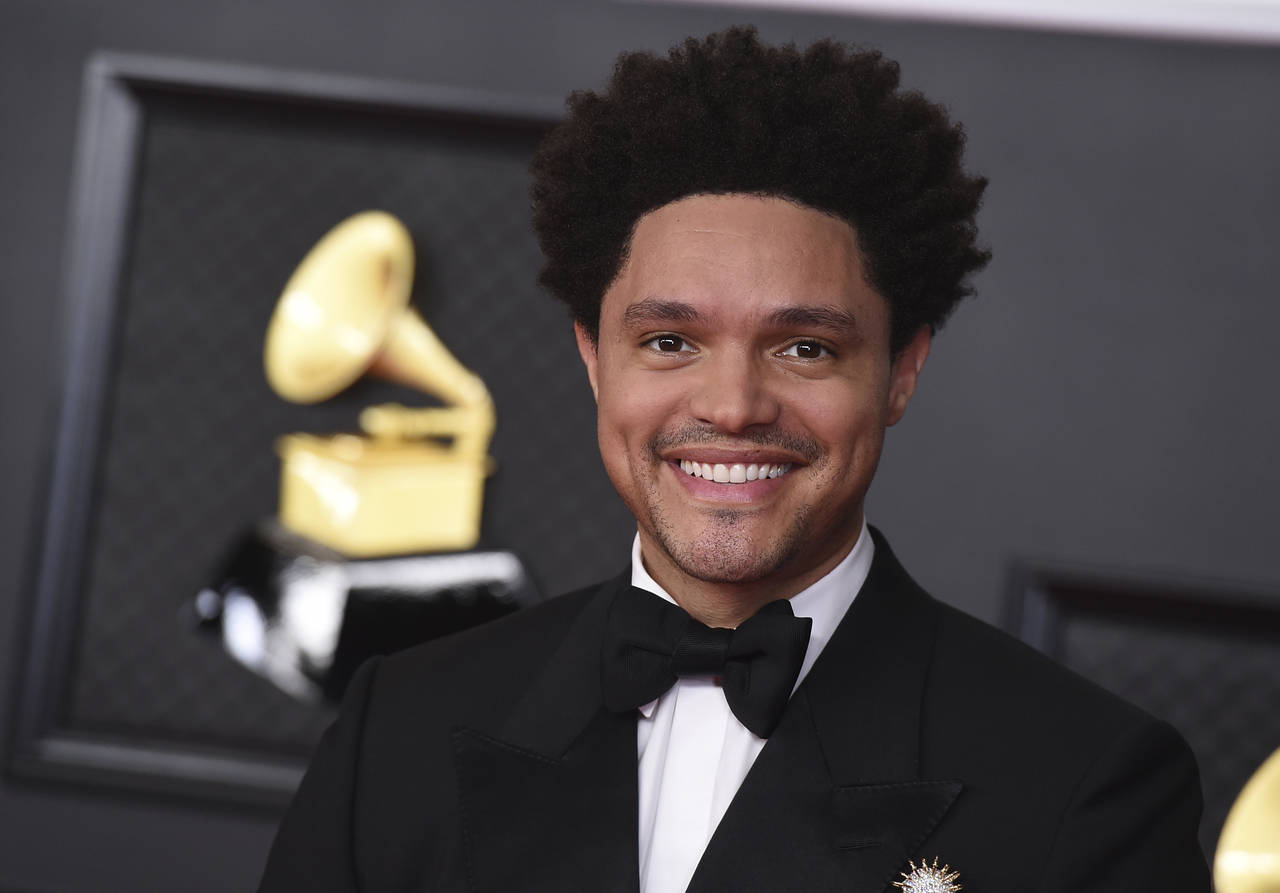 FILE - Trevor Noah appears at the 63rd annual Grammy Awards in Los Angeles on March 14, 2021. Noah ...