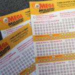 
              Mega Millions playslips are seen on a counter at a convenience store Tuesday, Jan. 3, 2023, in Northbrook, Ill. (AP Photo/Nam Y. Huh)
            