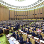 
              In this photo taken during Jan. 17-18, 2023 and provided by the North Korean government, North Korea’s parliament is held in Pyongyang, North Korea Saturday, Dec. 31, 2022. Independent journalists were not given access to cover the event depicted in this image distributed by the North Korean government. The content of this image is as provided and cannot be independently verified. Korean language watermark on image as provided by source reads: "KCNA" which is the abbreviation for Korean Central News Agency. (Korean Central News Agency/Korea News Service via AP)
            