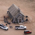 
              FILE - This aerial photo shows the movie set of  "Rust" at Bonanza Creek Ranch in Santa Fe, N.M., on Saturday, Oct. 23, 2021. Prosecutors announced Thursday, Jan. 19, 2023 they are charging Baldwin with involuntary manslaughter in fatal shooting of cinematographer on movie set.  (AP Photo/Jae C. Hong, File)
            