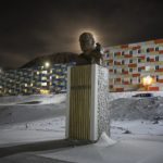 
              A full moon rises behind a statue of Lenin in Barentsburg, Norway, Saturday, Jan. 7, 2023. About 350 people live in Barentsburg, the village owned by Russia's Arctic mining company in the remote Norwegian territory. (AP Photo/Daniel Cole)
            