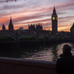 
              A man walks along the south bank of the River Thames backdropped by the Elizabeth Tower, known as Big Ben, of the Houses of Parliament, in London, Tuesday, Jan. 17, 2023. (AP Photo/Kin Cheung)
            