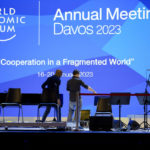 
              People set up the stage at the eve of the opening of the World Economic Forum in Davos, Switzerland, Sunday, Jan. 15, 2023. The annual meeting of the World Economic Forum is taking place in Davos from Jan. 16 until Jan. 20, 2023. (AP Photo/Markus Schreiber)
            