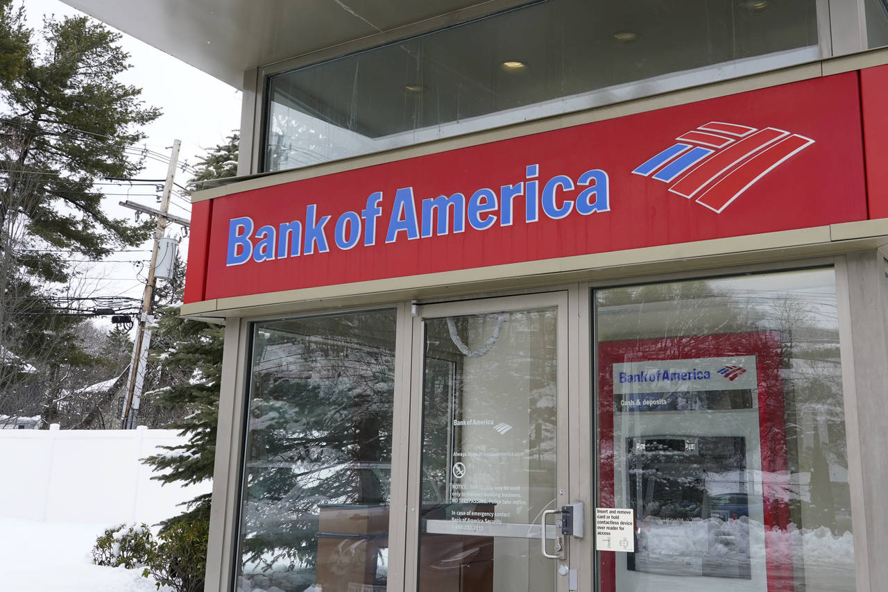 FILE - A Bank of America ATM is seen, Wednesday, Feb. 3, 2021, in Winchester, Mass. Bank of America...