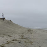 
              Survey work by a crew from Stockton University measures the countours of an eroded beach in North Wildwood, N.J. on Oct. 25, 2022. On Jan. 4, 2023, the city asked a judge to force the state environmental protection department to pay it $21 million to cover the cost of trucking in sand over the past decade. (AP Photo/Wayne Parry)
            