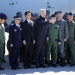 
              NATO Secretary-General Jens Stoltenberg, center, prepares to take a group photo with Japan Self-Defense members at Iruma Air Base in Sayama, northwest of Tokyo, Tuesday, Jan. 31, 2023. (AP Photo/Eugene Hoshiko)
            