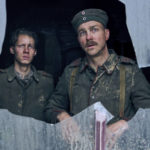 
              This image released by Netflix shows Felix Kammerer, left, and Albrecht Schuch in "All Quiet on the Western Front." (Reiner Bajo/Netflix via AP)
            