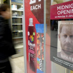 
              A poster advertises the midnight opening of a store to sell the new book by Prince Harry called 'Spare' in London, Monday, Jan. 9, 2023. Prince Harry has defended his memoir that lays bare rifts inside Britain's royal family. He says in TV interviews broadcast Sunday that he wanted to "own my story" after 38 years of "spin and distortion" by others. Harry's soul-baring new memoir, "Spare," has generated incendiary headlines even before its release. (AP Photo/Kirsty Wigglesworth)
            