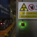 
              A truck carrying a shipping container enters an X-ray cargo scanning facility of the Dutch Customs at the Maasvlakte container terminal location in the port of Rotterdam, Netherlands, Monday, Jan. 9, 2023. Cocaine is spreading at an alarming rate through Europe, much of it through the world ports of Antwerp and Rotterdam. And a Tuesday, Jan. 10. 2023, announcement of massive seizures may well hide a bigger truth, that South American cartels are throwing ever more cocaine at the European market. (AP Photo/Peter Dejong)
            