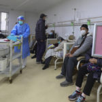 
              In this photo released by Xinhua News Agency, Patients wearing face masks receive oxygen therapy at a community healthcare institution in Shanghai, China, Monday, Jan. 5, 2023. As COVID-19 rips through China, other countries and the WHO are calling on its government to share more comprehensive data on the outbreak, with some even saying many of the numbers it is reporting are meaningless. (Fang Zhe/Xinhua via AP)
            