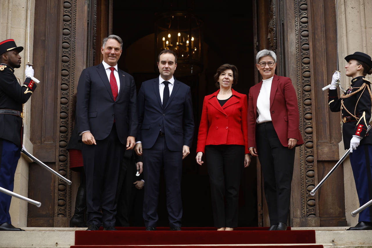 French Foreign Minister Catherine Colonna, second right, and French Defense Minister Sebastien Leco...