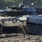 
              FILE - A Leopard 2 tank is pictured during a demonstration event held for the media by the German Bundeswehr in Munster near Hannover, Germany, Wednesday, Sept. 28, 2011. Poland will apply to the German government for permission to supply the German-made Leopard battle tanks to Ukraine. (AP Photo/Michael Sohn, File)
            