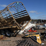 
              Debris stretches across a field after a tornado that ripped through Central Alabama earlier this week along County Road 140 where loss of life occurred Saturday, Jan. 14, 2023, in White City, Autauga County, Ala. (AP Photo/Butch Dill)
            