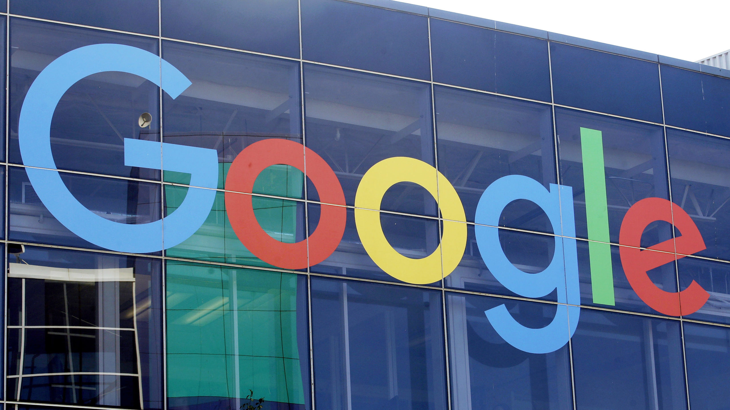 FILE - A sign is shown on a Google building at their campus in Mountain View, Calif., Sept. 24, 201...