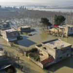
              An aerial view of the al-Tlul village flooded after a devastating earthquake destroyed a river dam in the town of Salqeen near the Turkish border, Idlib province, Syria, Thursday, Feb. 9, 2023.   (AP Photo/Ghaith Alsayed)
            