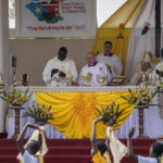 
              Pope Francis, center, leads a Holy Mass at the John Garang Mausoleum in Juba, South Sudan Sunday, Feb. 5, 2023. Pope Francis is in South Sudan on the final day of a six-day trip that started in Congo, hoping to bring comfort and encouragement to two countries that have been riven by poverty, conflicts and what he calls a "colonialist mentality" that has exploited Africa for centuries. (AP Photo/Ben Curtis)
            