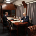 
              President Joe Biden sits on a train with National Security Advisor Jake Sullivan as he goes over his speech marking the one-year anniversary of the war in Ukraine after a surprise visit with Ukrainian President Volodymyr Zelenskyy, Monday, Feb. 20, 2023, in Kyiv. (AP Photo/ Evan Vucci)
            