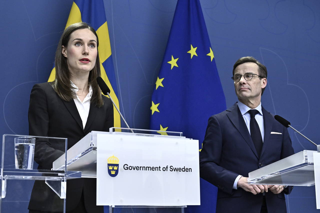 Finland's Prime Minister Sanna Marin, left, and Sweden's Prime Minister Ulf Kristersson attend a jo...