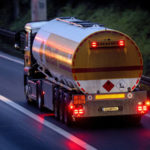 
              FILE - A fuel trucks drives along a highway in Frankfurt, Germany, Jan. 27, 2023. European Union governments tentatively agreed Friday Feb. 3, 2023, to set a $100-per-barrel price cap on sales of Russian diesel to coincide with an EU embargo on the fuel — steps aimed at ending the bloc's energy dependence on Russia and limiting the money Moscow makes to fund its war in Ukraine. (AP Photo/Michael Probst, File)
            