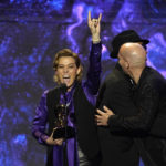
              Brandi Carlile gestures onstage while accepting the award for best rock song for "Broken Horses" at the 65th annual Grammy Awards on Sunday, Feb. 5, 2023, in Los Angeles. (AP Photo/Chris Pizzello)
            
