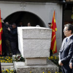 
              North Macedonia's President Stevo Pendarovski, second from right and Prime Minister Dimitar Kovacevski, right, pay respect at the grave of Goce Delcev, a revolutionary who opposed Ottoman rule in the Balkans that ended after hundreds of years in the early 20th century, at the church of the Ascension of Jesus, in Skopje, North Macedonia, Saturday, Feb. 4, 2023. North Macedonia on Saturday honoured the birth of 19th century revolutionary hero Goce Delcev with tight security amid fears of potential clashes between opposing nationalist groups from North Macedonia and Bulgaria, as both countries have claims of the historic figure. (AP Photo/Boris Grdanoski)
            